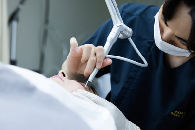 Dr. Donghyun Youn performing a clinical treatment